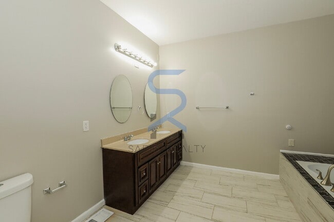 Building Photo - Move in before February 15th and choose your reward: a $250 Amazon Gift Card or a 55" Smart TV!