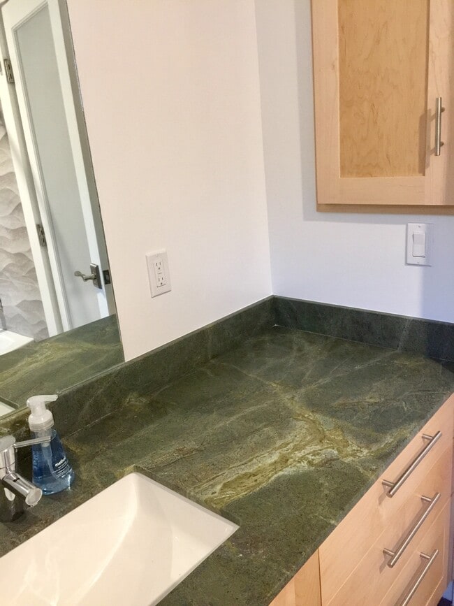 Granite bathroom surfaces, custom maple bathroom cabinet - 3918 Webster St