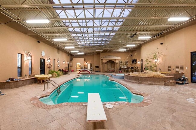 Building Photo - Furnished 5-Bedroom Home with Indoor Pool & Amenities