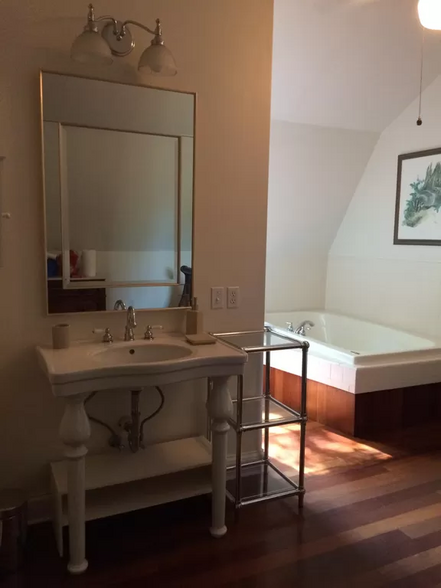 Luxurious Jacuzzi tub in bedroom space. Walk-in shower behind corner. - 7923 Old 3C Hwy