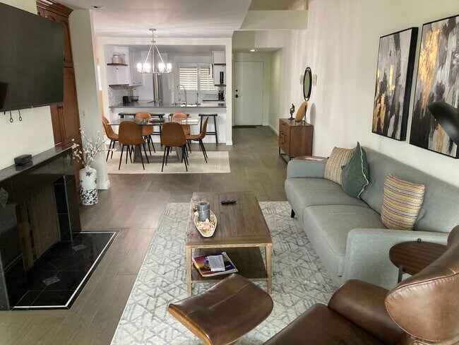 Building Photo - Beachside Furnished Retreat! Remodeled 2BD/2BA Condo Steps from the Sand!