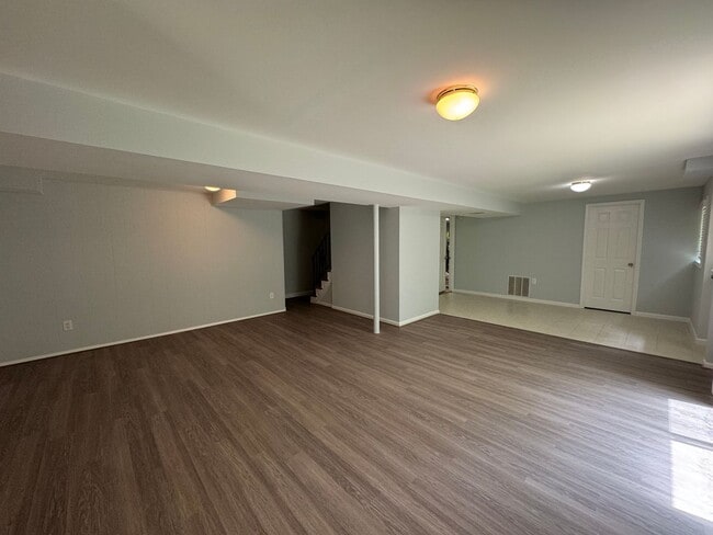Building Photo - Sought-After 4 Bed 3 Bath L-Shaped Rambler...