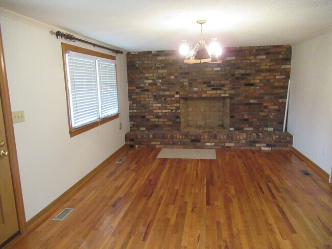 Building Photo - Charming All-Brick Ranch with Finished Bas...