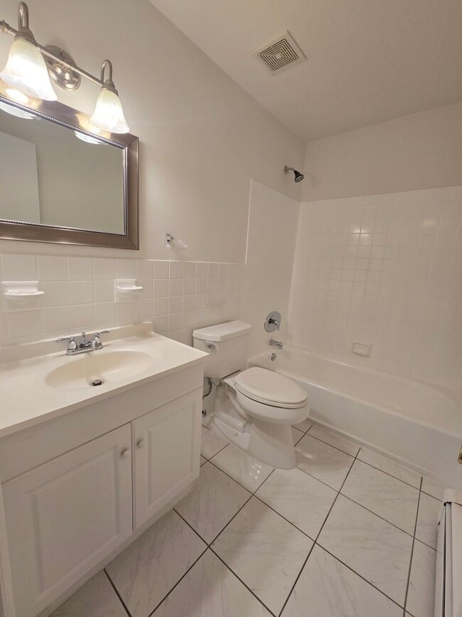 Building Photo - Updated, spacious 1st fl 1-bedroom/1-bathroom condominium with most utilities included & lots of ...