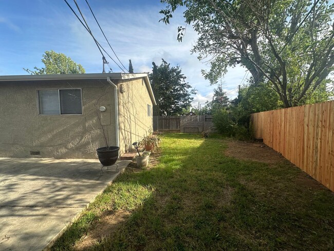 Building Photo - Recently Updated 4 Bedroom Home with Yard