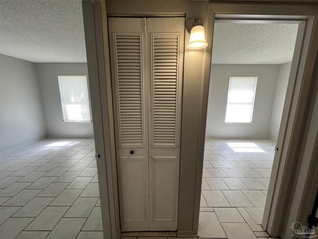 Building Photo - 6809 Tiki Ln