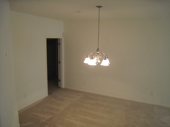 Building Photo - Spacious condo with attached garage.