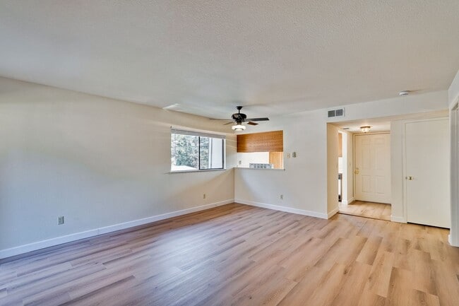 Building Photo - New Vinyl Plank Flooring, Fresh Interior Paint, 1 Car Garage + 1 Assigned Outdoor Parking Space -...