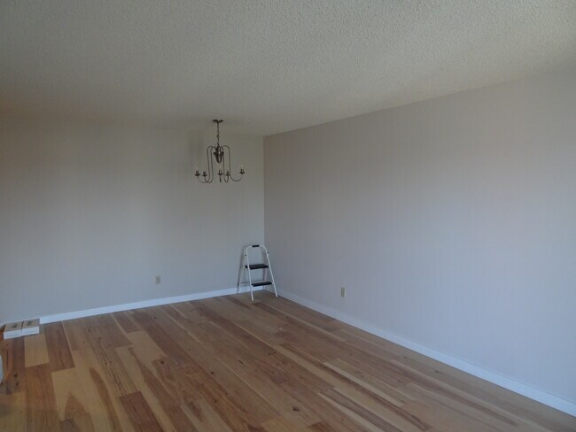 Dining area with new flooring - 78 10th St E