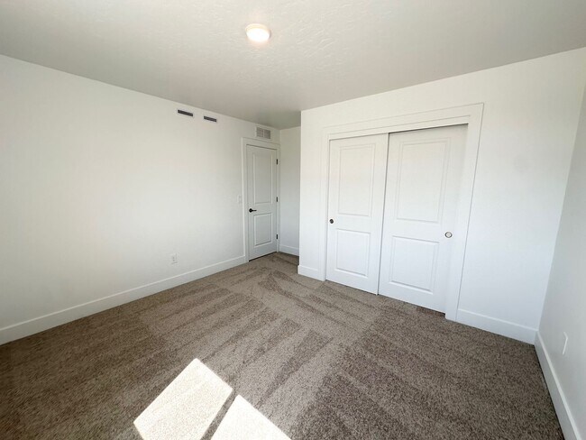 Building Photo - Spacious Luxury Townhome Designed for Modern Living available soon!