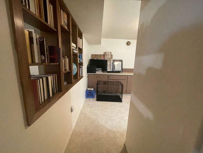 Building Photo - Spacious, four-bedroom, two-bathroom, coun...