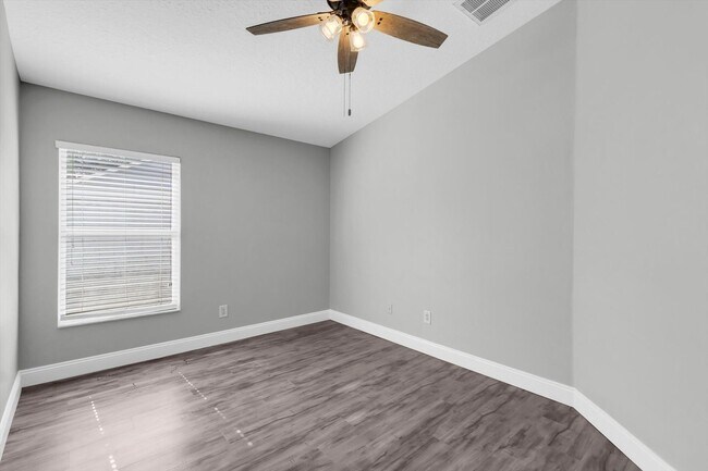 Building Photo - Spacious Renovated 4-Bedroom Home in Land O’ Lakes Near Veterans Expressway