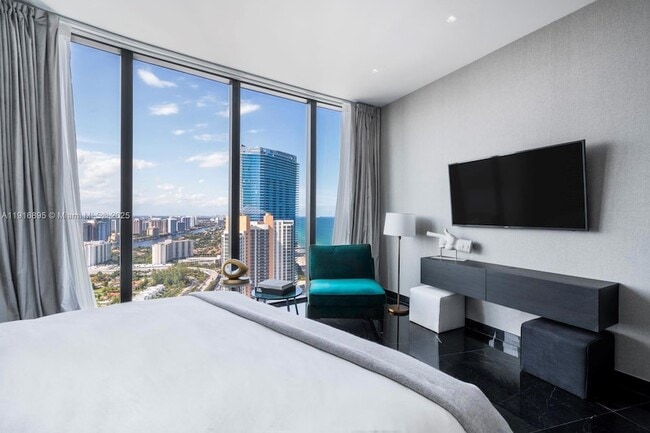 Building Photo - 18555 Collins Ave