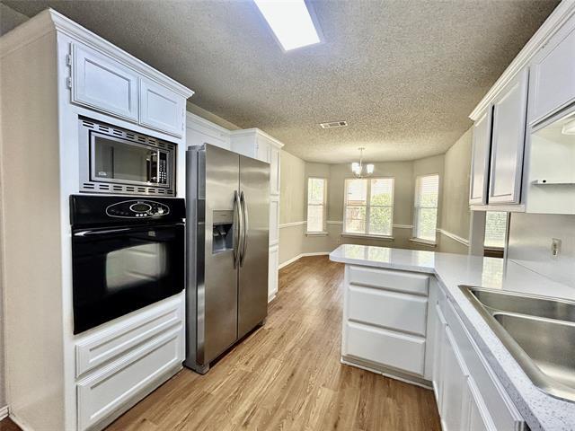 Building Photo - 7724 Sagebrush Ct N