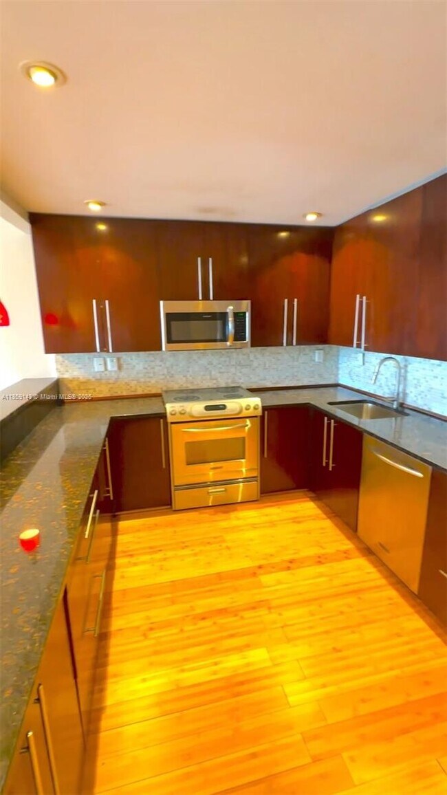 Building Photo - 19390 Collins Ave