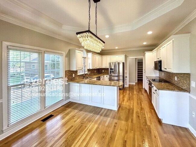 Building Photo - 4-Bedroom, 3.5-Bathroom Home in a Peaceful...