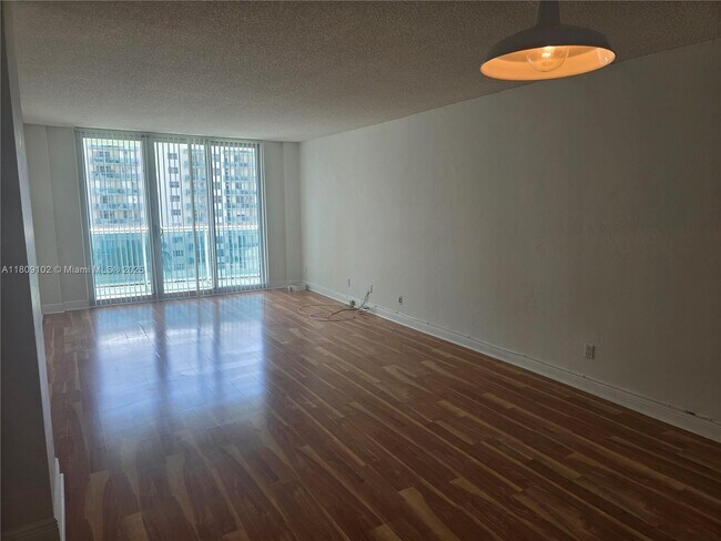 Building Photo - 19380 Collins Ave