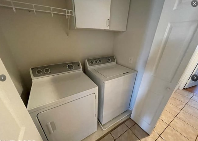 Building Photo - 2 bedroom 2 bath 1 car garage in a gated n...
