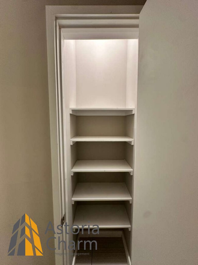 Building Photo - Beautifully Renovated 3BR Rowhome Near Johns Hopkins – Gated Parking + Modern Upgrades