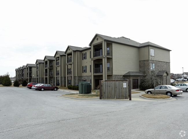 Exterior view from parking lot - Villas at Quail Creek Apartments