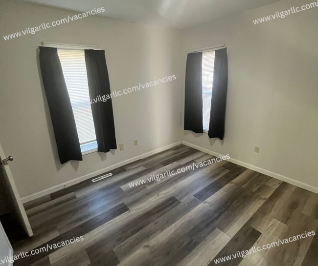 Building Photo - 3 Bedrooms • 1 Large Bathroom, Master suite is a spacious 2nd-floor loft-style bedroom with added...