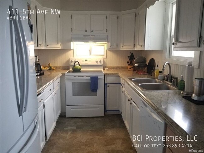 Building Photo - 411-5th Ave NW-