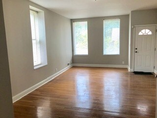 Large windows, tons of natural light, hardwood floors in living space - 2126 Withnell Ave