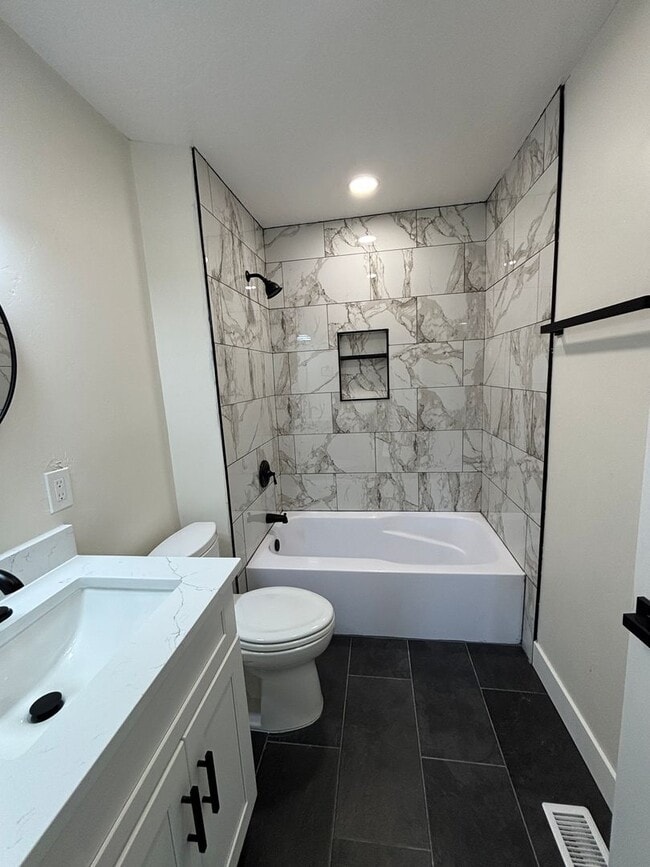Building Photo - Beautifully Renovated 4-Bedroom Home with Finished Basement