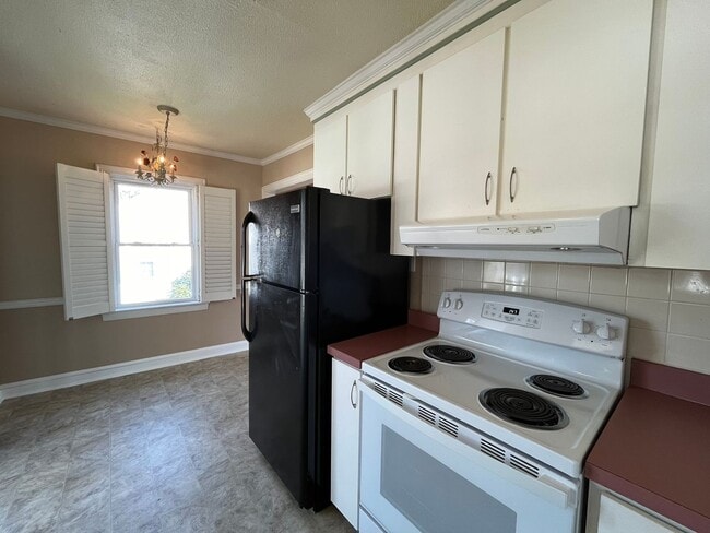 Building Photo - Cozy 1BD, 1BA Near Downtown Raleigh House with Fenced Yard
