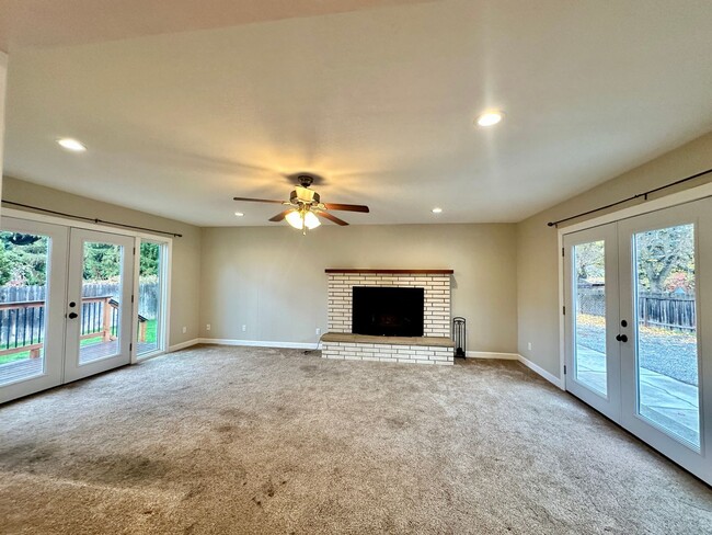 Building Photo - Stunning 2 level home with wood floors and...