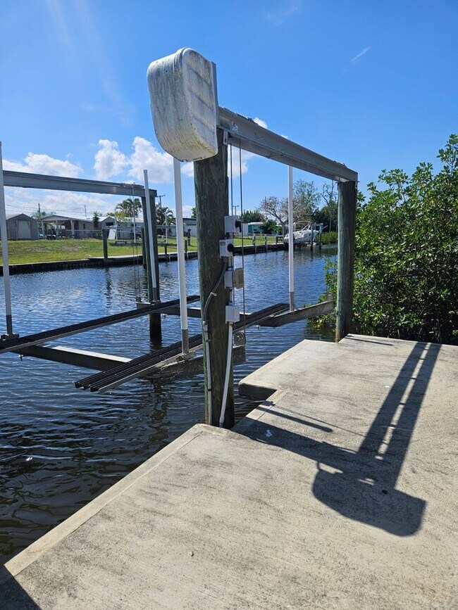 Building Photo - Port Charlotte Waterfront salt water pool annual rental