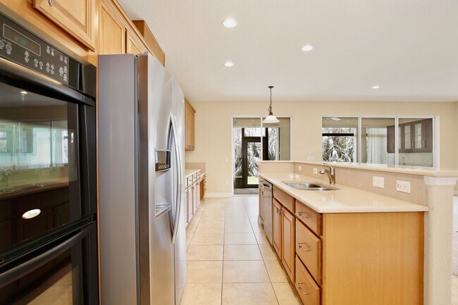 Building Photo - Stylish and Spacious 3/2.5 Townhome with Premium Features and Community Pools