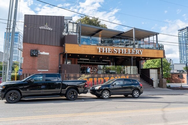 Building Photo - **WALKABLE MIDTOWN CONDO WITH BALCONY AND ...