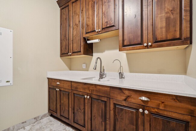 Building Photo - 2 Creeks Condominiums - Gated Community on...