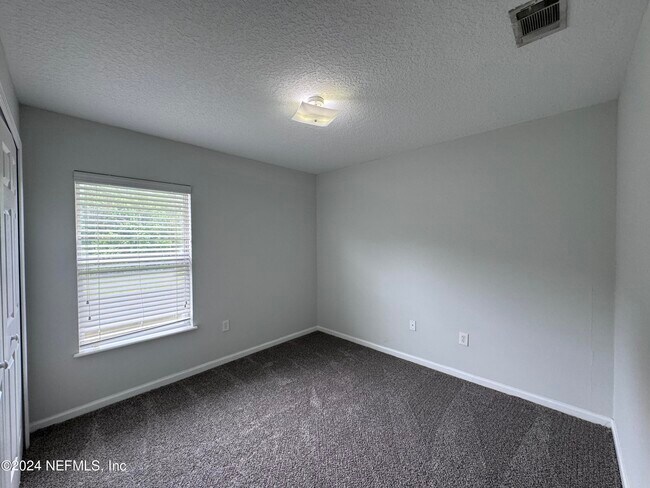 Building Photo - 6985 Ortega Woods Dr