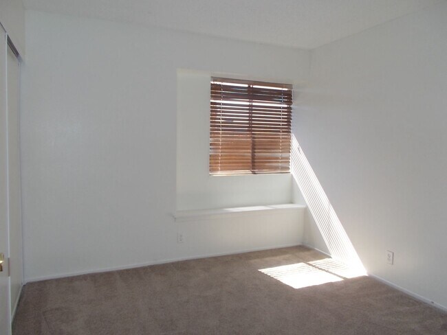 Building Photo - 4-Bedroom Home with Spacious Backyard