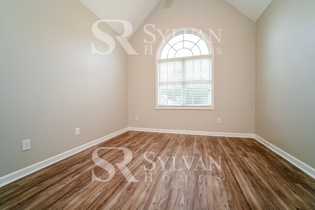 Building Photo - Welcome to this charming abode.