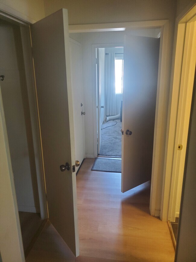 upstairs hallway with closets - 5834 Bowcroft St