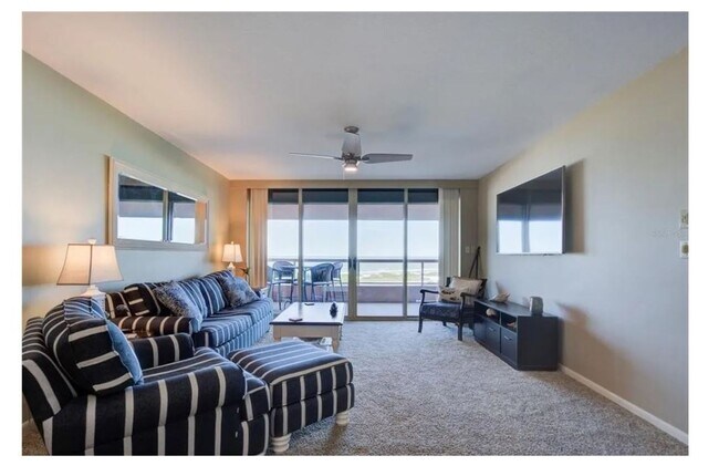 Building Photo - Newly Renovated Beachfront Condo with Stun...