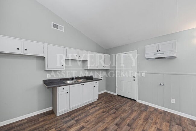 Building Photo - A Must See/ High Vaulted ceiling's & Section 8 Welcome!!!