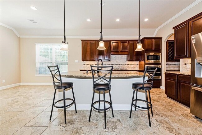 Building Photo - 6838 Adrienne Arbor Dr
