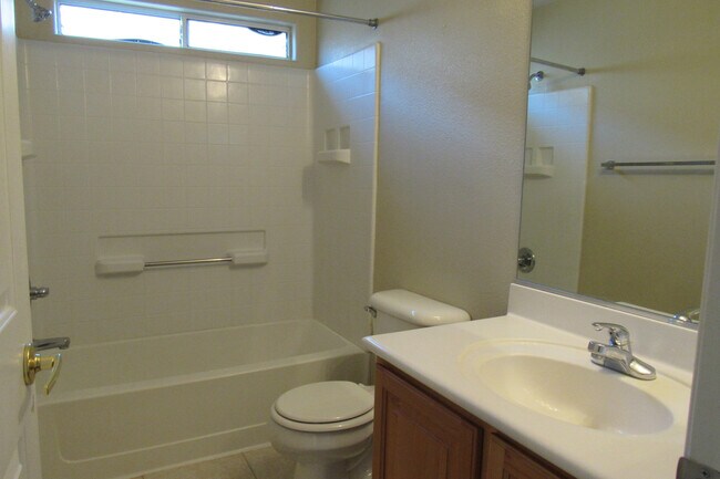 Building Photo - AMAZING 2 STORY TOWNHOME LOCATED IN A GATE...