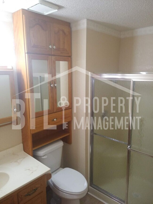 Building Photo - Condo by Lake with RV Spot!! 55+ Community