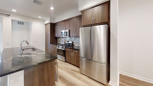 Building Photo - Modern Tri-Level Townhome Near Disneyland with Rooftop Patio