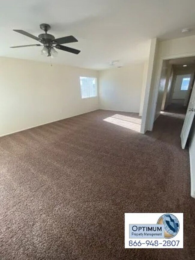 Building Photo - Spacious 4-Bedroom Home with 3-Car Garage & Downstairs Suite!