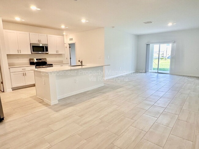 Building Photo - 8406 Blue Wave Ln E