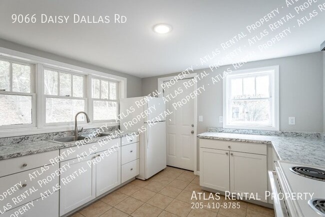 Building Photo - 9066 Daisy Dallas Rd