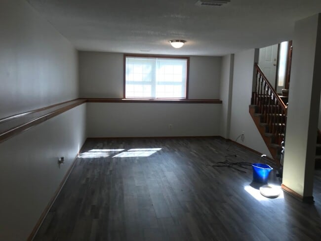 Building Photo - {1601} Spacious Duplex + Two Car Garage + Finished Basement + Fort Osage School District