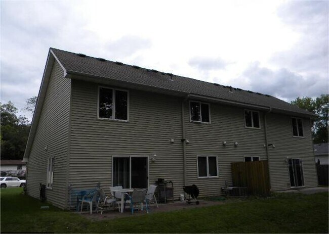 Building Photo - 1040/1044 4th St SE, Forest Lake, MN 55129...