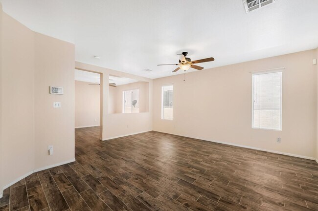 Building Photo - Gated Living with Community Pool & Thoughtfully Designed Open Layout!